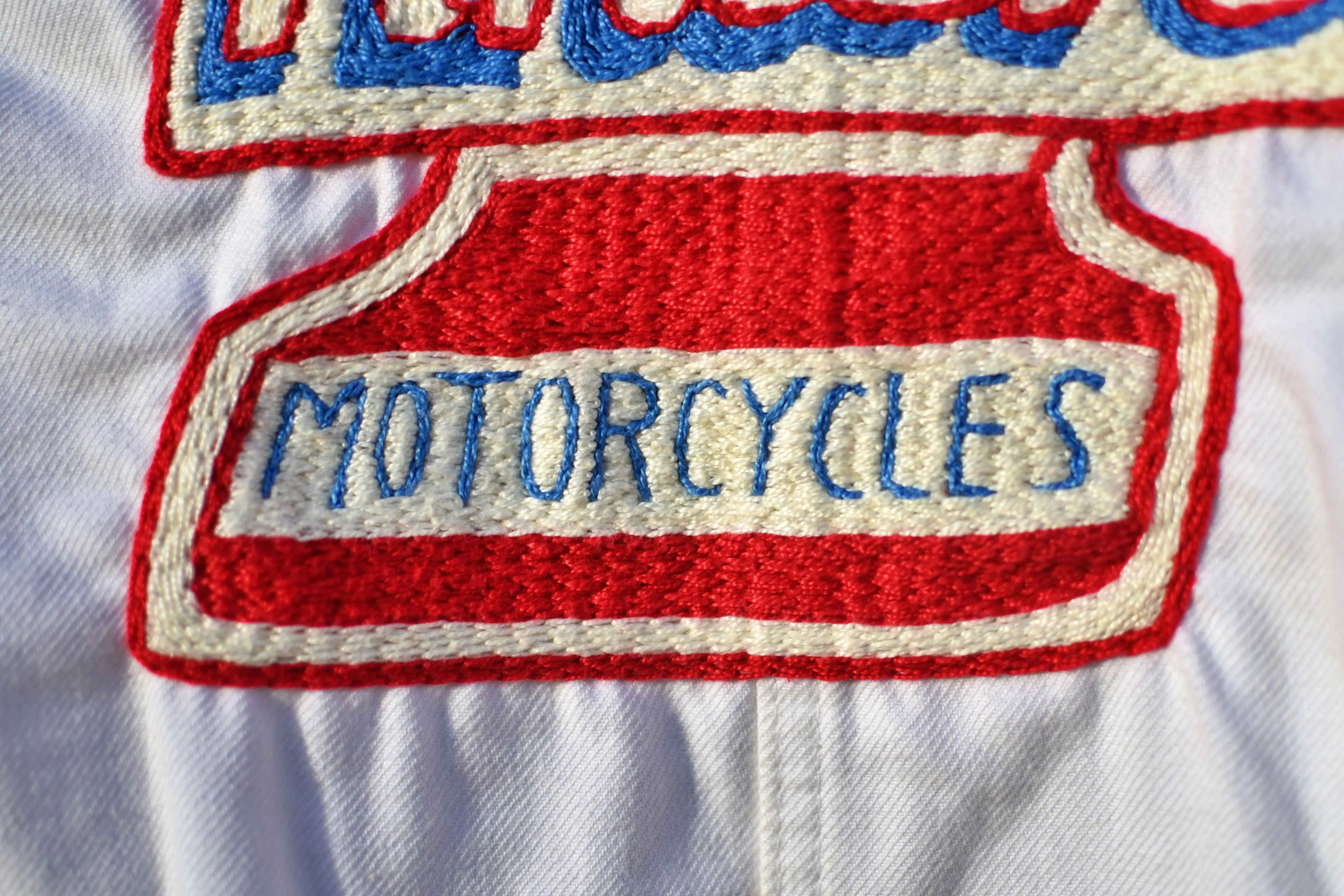 Jacket white workwear from the 50's Evel Knievel  hand embroidered chainstitch/veste ouvrière brodée main point de chaînette